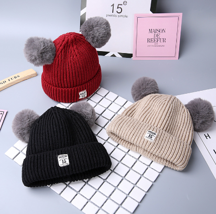 Bonnet hiver bébé avec pompom