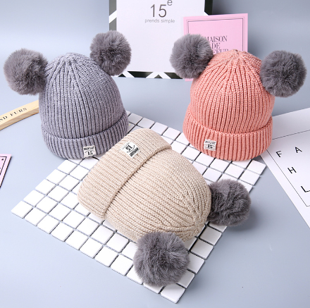 Bonnet hiver bébé avec pompom