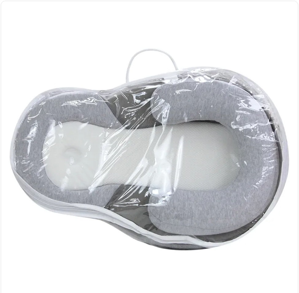 Coussin ergonomique de maintient pour bébé.