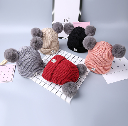 Bonnet hiver bébé avec pompom
