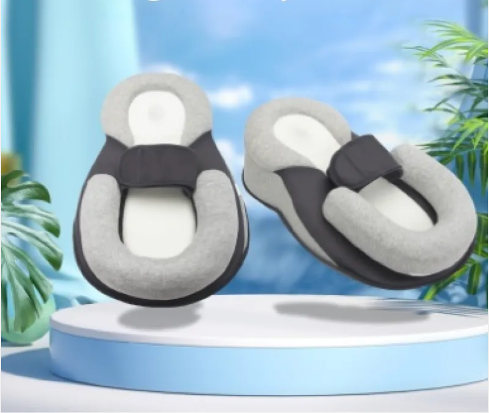 Coussin ergonomique de maintient pour bébé.